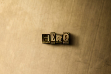 hero - close-up of grungy vintage typeset word on metal backdrop. royalty free stock illustration. c