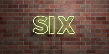 SIX - Fluorescent Neon Tube Sign On Brickwork - Front View - 3D Rendered Royalty Free Stock Picture. Can Be Used For Online Banner Ads And Direct Mailers..