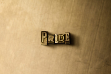 PRIDE - close-up of grungy vintage typeset word on metal backdrop. Royalty free stock illustration.  Can be used for online banner ads and direct mail.