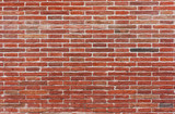 Fototapeta  - Brick red wall exactly in a row