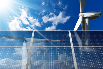 Wall Mural - Solar panels and wind turbines on a blue sky with clouds