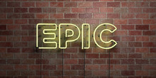 EPIC - Fluorescent Neon Tube Sign On Brickwork - Front View - 3D Rendered Royalty Free Stock Picture. Can Be Used For Online Banner Ads And Direct Mailers..