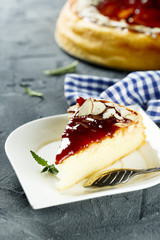 Sticker - Cheesecake with berry sauce and almond