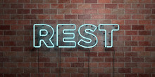 REST - Fluorescent Neon Tube Sign On Brickwork - Front View - 3D Rendered Royalty Free Stock Picture. Can Be Used For Online Banner Ads And Direct Mailers..