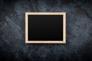 Wall Mural - Picture frame on a grey wall