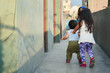 © ruslanita - Poor latin siblings playing