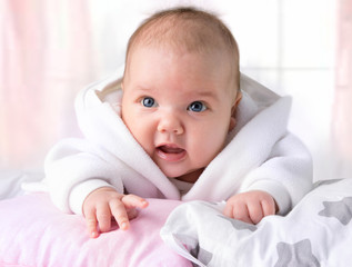 Wall Mural - Baby child infant in bed indoors.Child portrait.