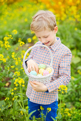 Canvas Print - smiling boy with easter eggs