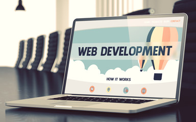 Wall Mural - web development on laptop in conference hall. 3d.