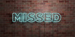 MISSED - fluorescent Neon tube Sign on brickwork - Front view - 3D rendered royalty free stock picture. Can be used for online banner ads and direct mailers..