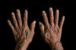 © DN6 - The old woman's hands on black background