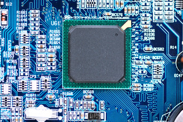 Computer motherboard with close-up of CPU processor