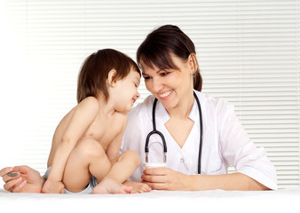 Pediatrician doctor with  girl