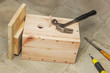 © sever180 - Ready birdhouse and tool lying on the floor  in the workshop