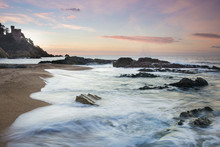 Spain, Costa Brava, Lloret De Mar, View From The Beach To Castillo De Los Plaja At Sunrise