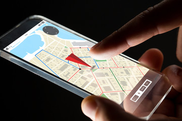 Poster - close up of hand with gps map on smartphone