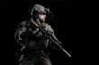 Spec ops soldier SWAT/Special Forces soldier in helmet with night vision device and rifle on dark background