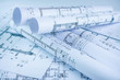 © dziewul - Architect rolls and house plans, close up