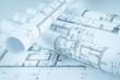 © dziewul - Architect rolls and house plans, close up
