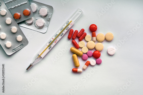 A Lot Of Tablets For Treatment Of Diseases Are Scattered On A