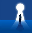  freedom concept,businessman standing  in front of keyhole with light