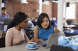 © Monkey Business - Two Businesswomen Have Informal Meeting In Office Coffee Bar