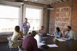 © Monkey Business - Businessman Standing To Address Boardroom Meeting