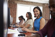 © Monkey Business - Portrait Of Staff In Busy Customer Service Department Shot