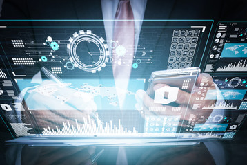 Close up of business man working on the digital mobile device.