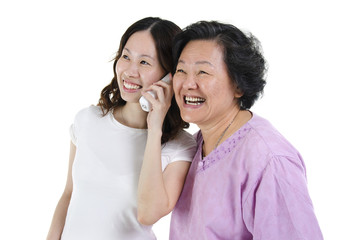 Wall Mural - Daughter and mother calling on phone