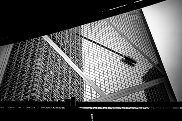 windows of commercial building in Hong Kong with B&W color