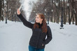 © izida1991 - girl on a winter outing photographed themselves on the phone