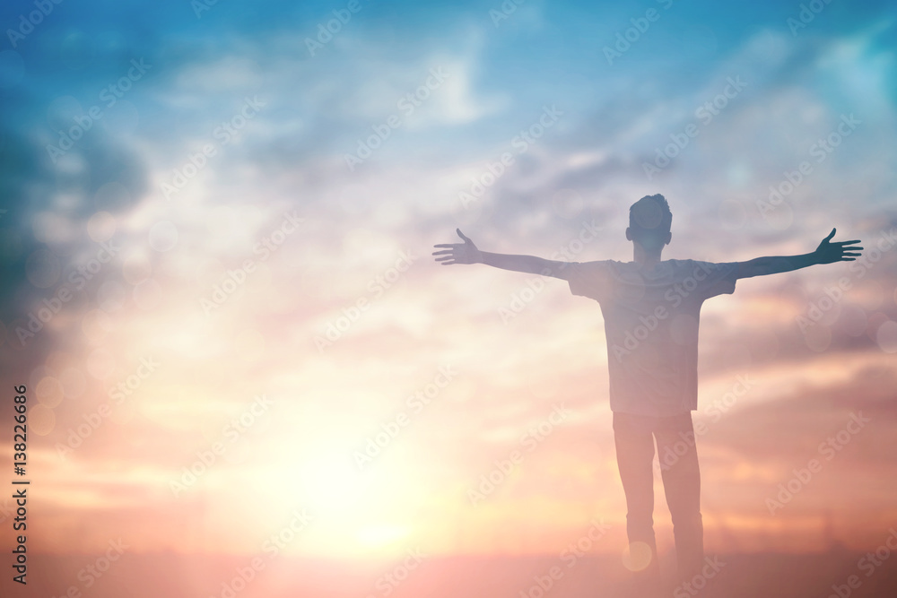 Man celebrating worship god in morning. Christian open hand over sunset inspire praise for peace cross concept for freedom financial, vision and mission, self motivation, hope faith love, stray - obrazy, fototapety, plakaty 