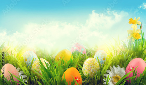 Easter nature spring scene background. Beautiful colorful eggs in spring  grass meadow - Buy this stock photo and explore similar images at Adobe  Stock | Adobe Stock
