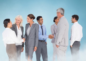 Wall Mural - Happy Business group meeting against a blue background