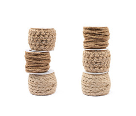 Wall Mural - Pile of rope bobbins isolated