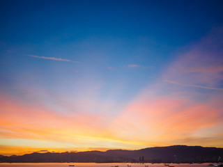 Wall Mural - Sunset on Penang island city. Beautiful landscape with dark blue and yellow sky.