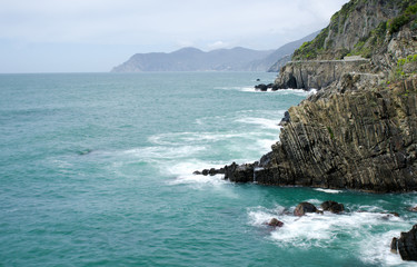 Sticker - long exposure moody dramatic seascape with rocks and motion blur