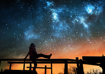 Wall Mural - girl watching the stars