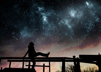 Wall Mural - girl watching the stars