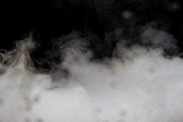 Leinwandbilder - Smoke on a black background.