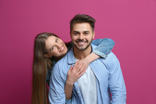 Cute Young Couple On Color Background