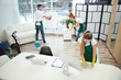 © Africa Studio - Team of cleaning service working at office
