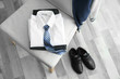 © Africa Studio - Clothes of schoolboy on chair indoors