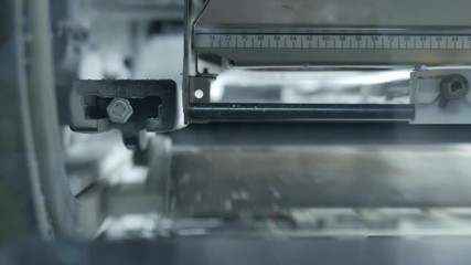 Envelopes on the assembly line in a factory with stroboscopic light