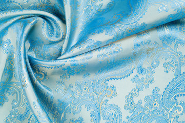 Fabric silk texture, background. Blue patterned