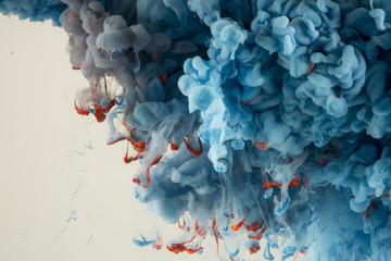 abstract colourful paint in water background
