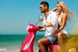 © ASjack - Couple in scooter on the beach background