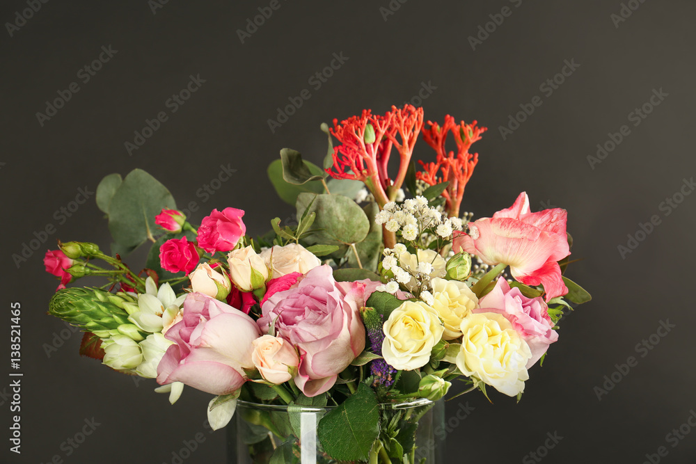 Beautiful bouquet of fresh flowers on black background