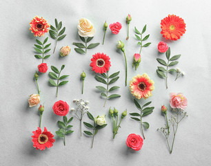 Poster - Flat lay of fresh flowers on white background